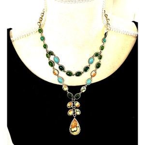 Vintage Monet Y shape gold tone necklace with shades of peach and green 22"